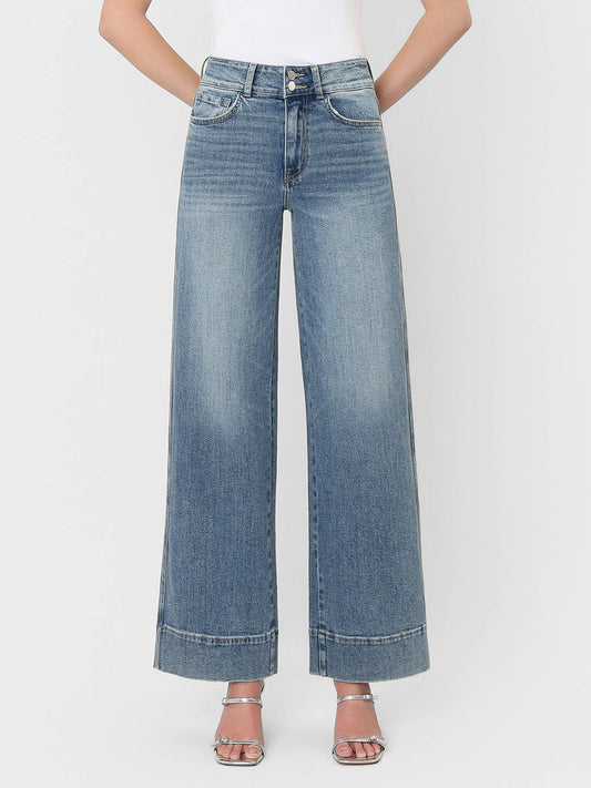 Wide-leg jeans worn by a person on a white background